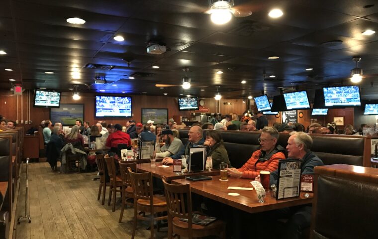 Diners at the Park Tavern watching the Twins game