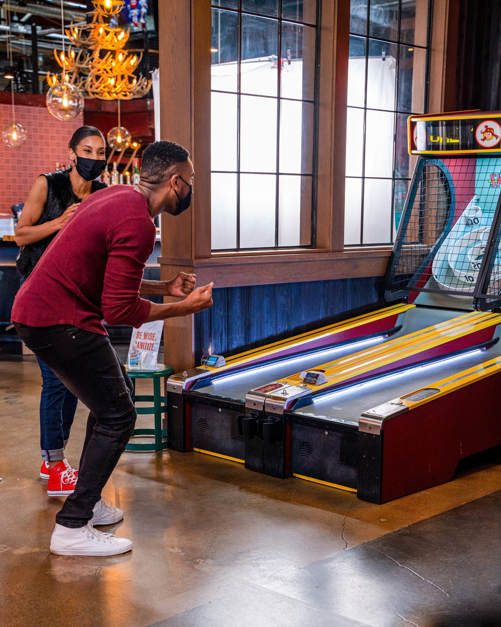 couple playing skeeball