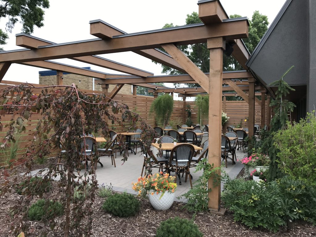 pergola covered patio at Lat14 Asian Eatery