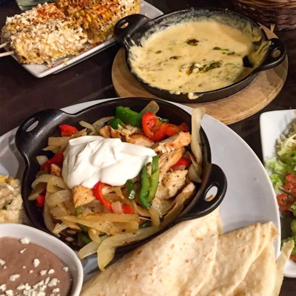 fajitas, queso dip, and cotija grilled corn