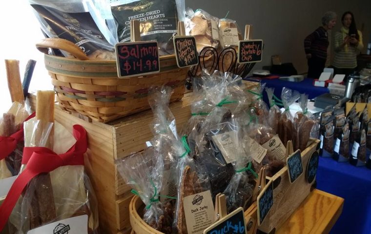 an array of food products available for sale at the winter market