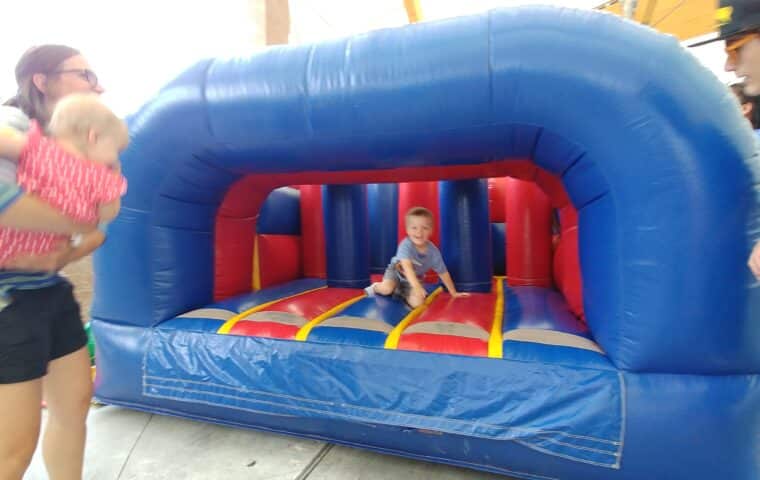 A child inside an inflatable at Nickel-Rama in Golden Valley